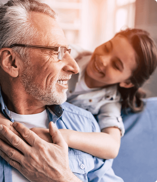 smiling young girl with grandfather